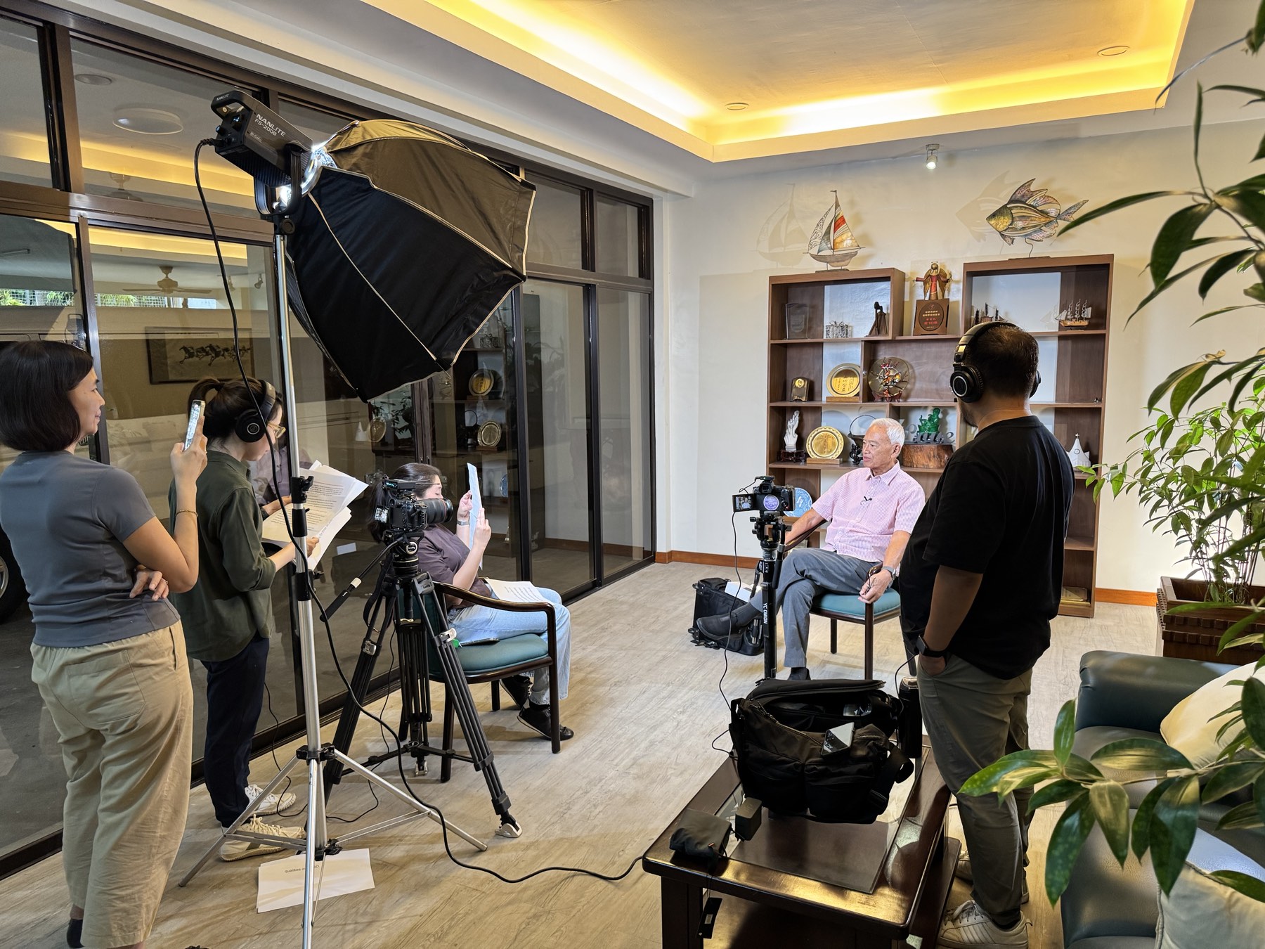 CREVO crew recording an interview with a JCAAA executive